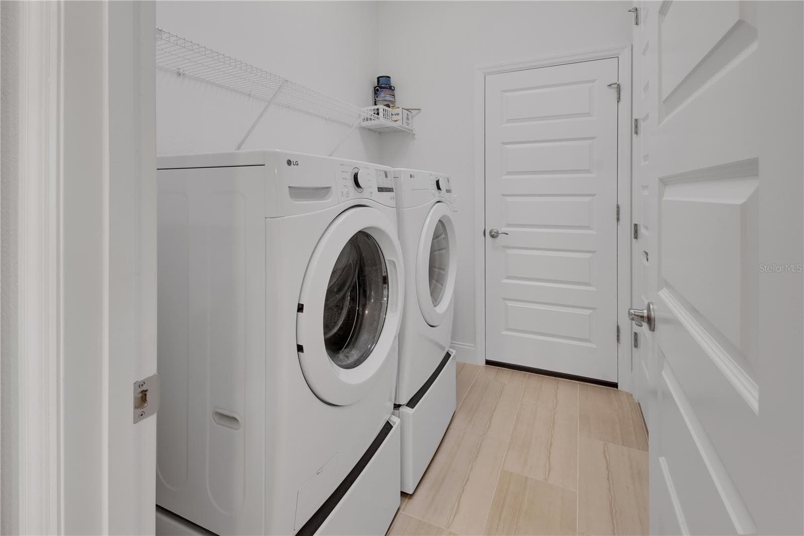 Laundry Room with storage closet - 1022 MEGANO BLVD, DELAND
