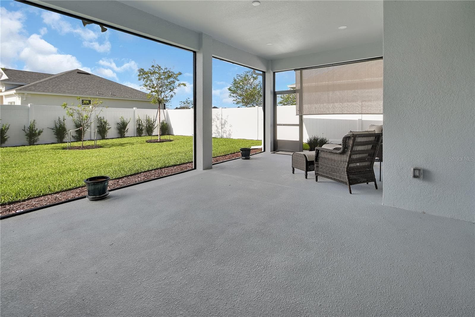Screen lanai and fenced backyard - 1022 MEGANO BLVD, DELAND