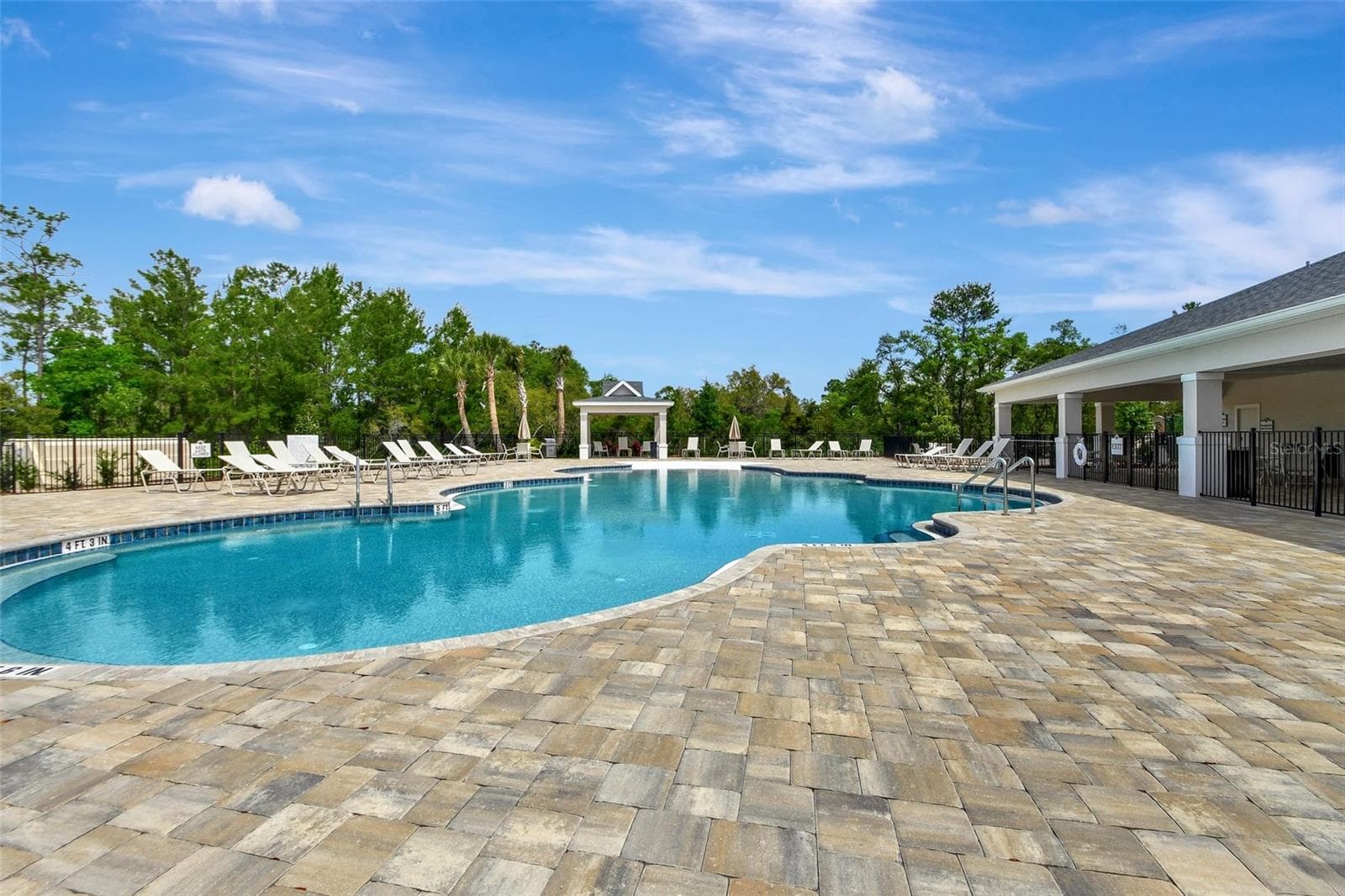 Beach Entry on one end of pool and seating for sunning - 1022 MEGANO BLVD, DELAND