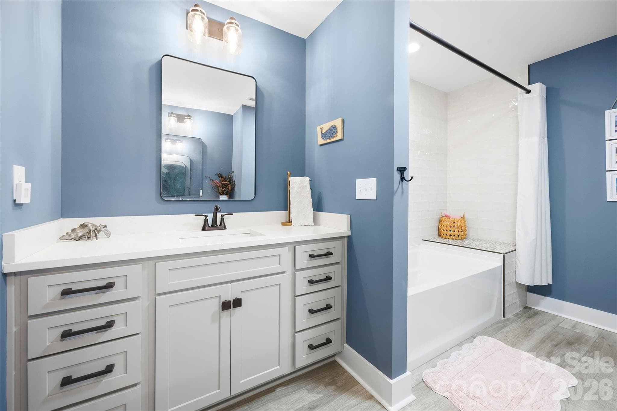 Laundry room with sink right off garage on main level - 2665 Umberger Road, Cleveland