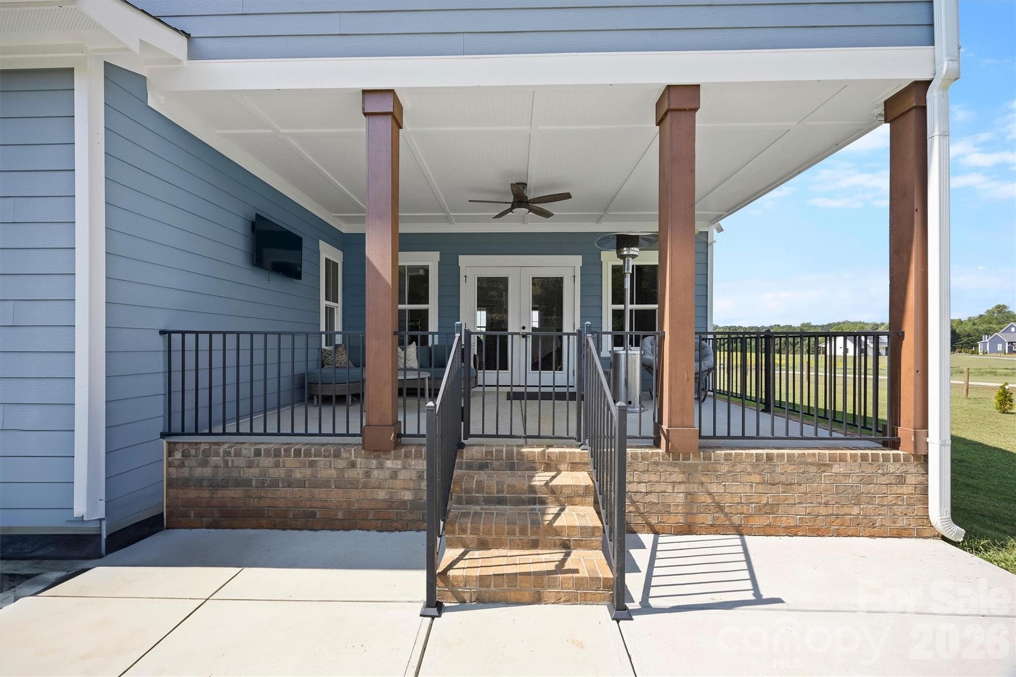 Extra concrete patio space off covered porch - 2665 Umberger Road, Cleveland