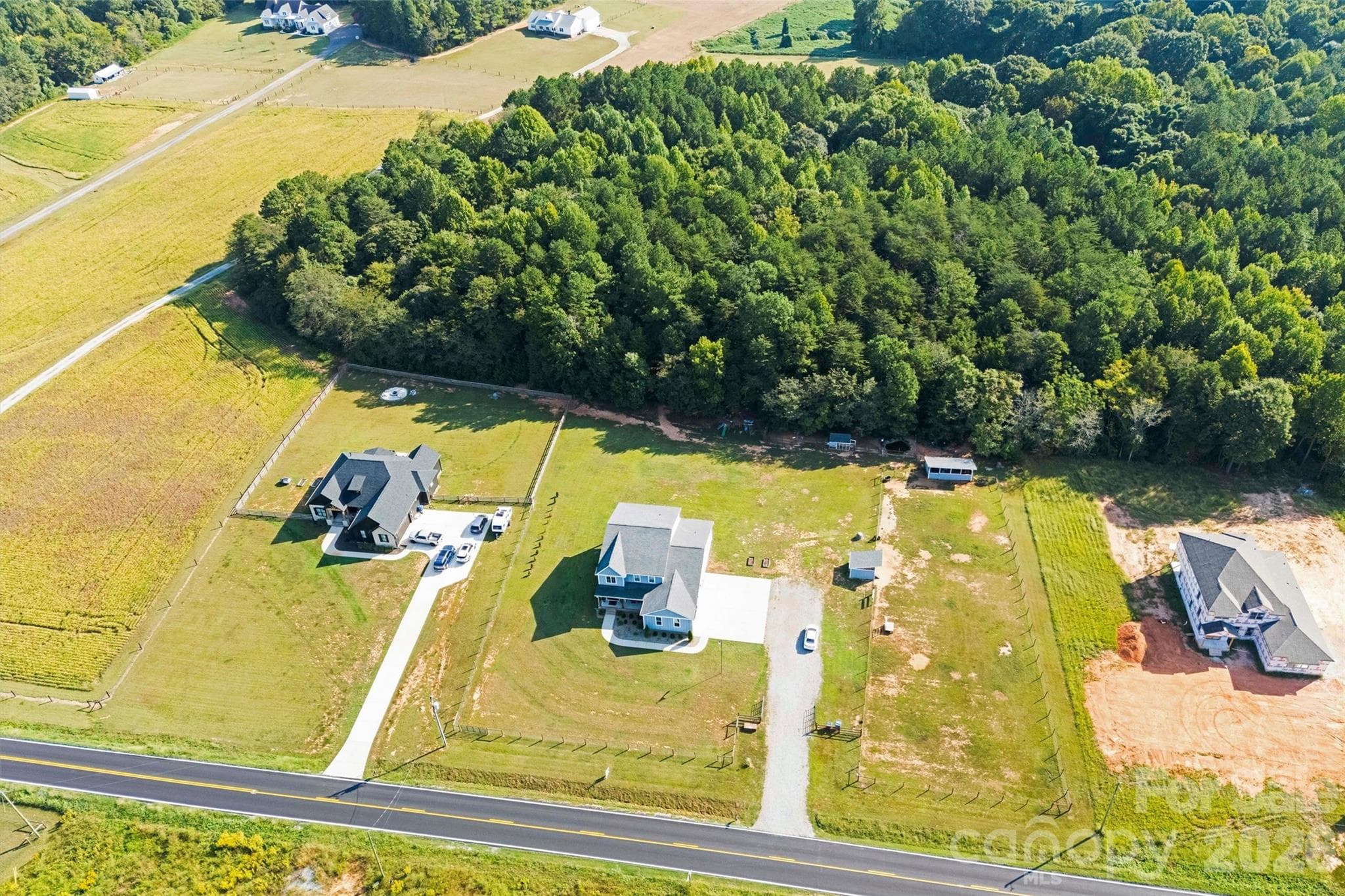 Wooded trails between back yard of house and back fenced pasture - 2665 Umberger Road, Cleveland