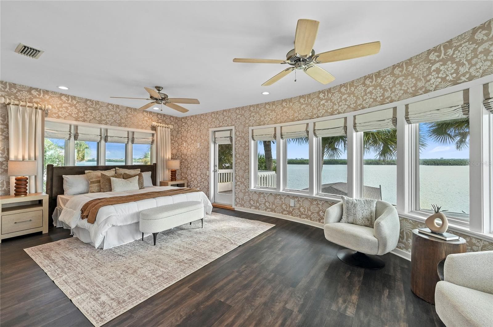 Primary Suite: River Views and Natural Gas Fireplace - 1215 COMMODORE DR, NEW SMYRNA BEACH