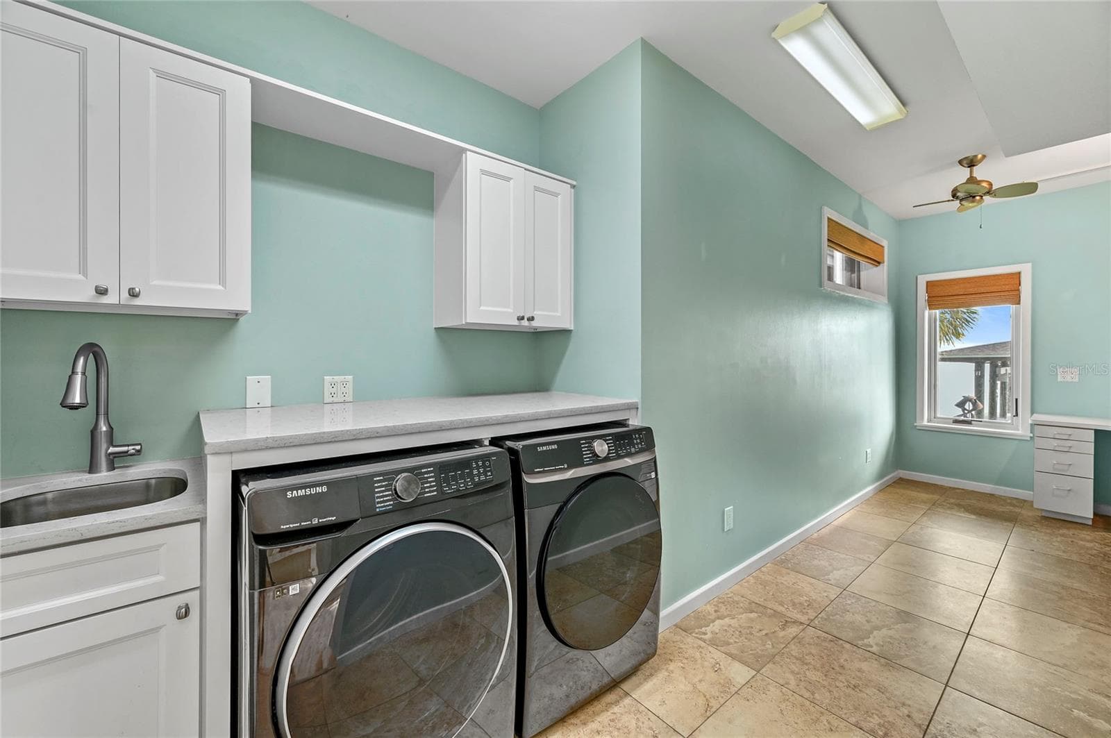 Laundry Room w/ River View and Office Area / Folding Counter - 1215 COMMODORE DR, NEW SMYRNA BEACH