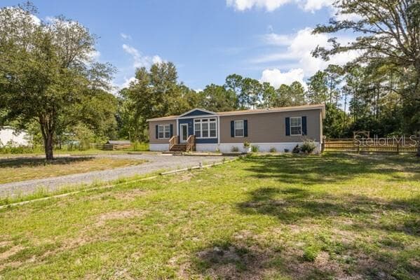 Manufactured Home at 1225 HAZELNUT ST, BUNNELL, photo 35 of 36