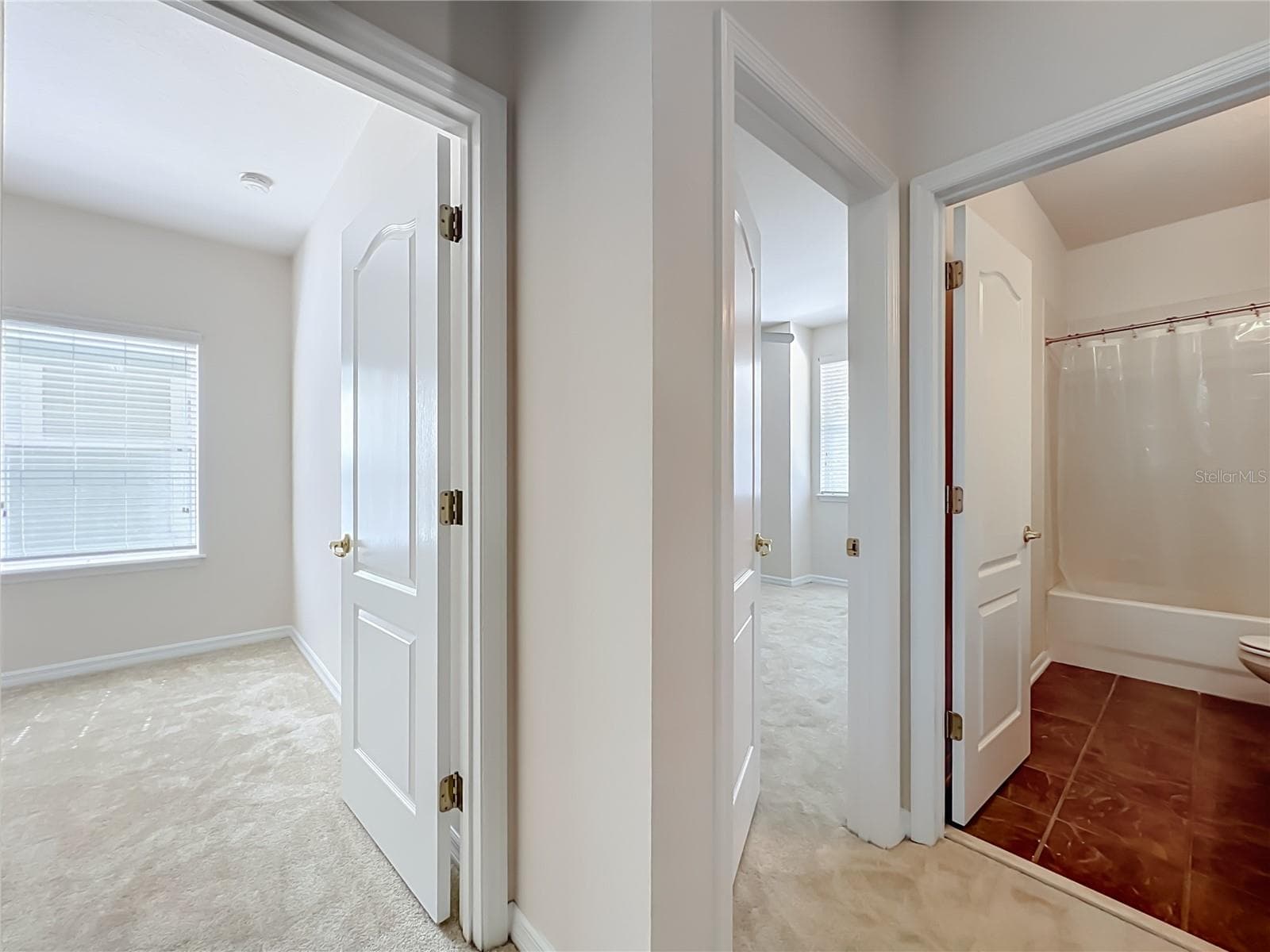 3 bedrooms at the end of the hall, and hall bath - 12809 HOLDENBURY LN, WINDERMERE