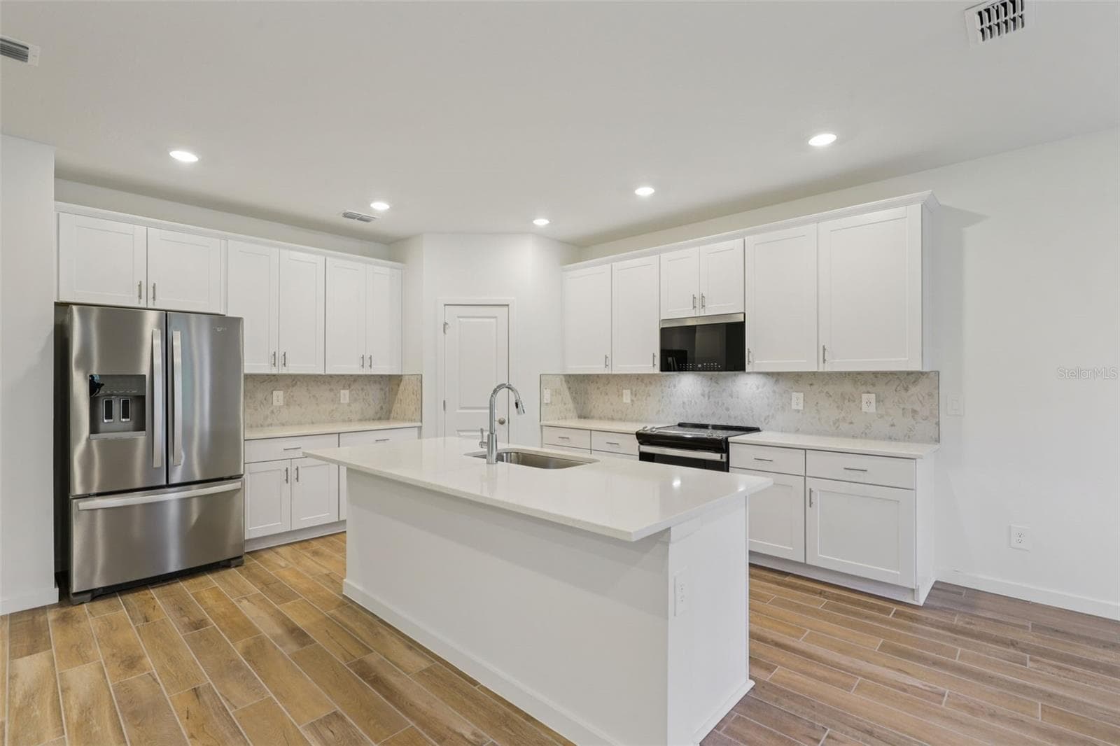 The interior photos are of another home with the same floor plan and interior finishes. Some details may vary - 4 GARNI DR, PALM COAST