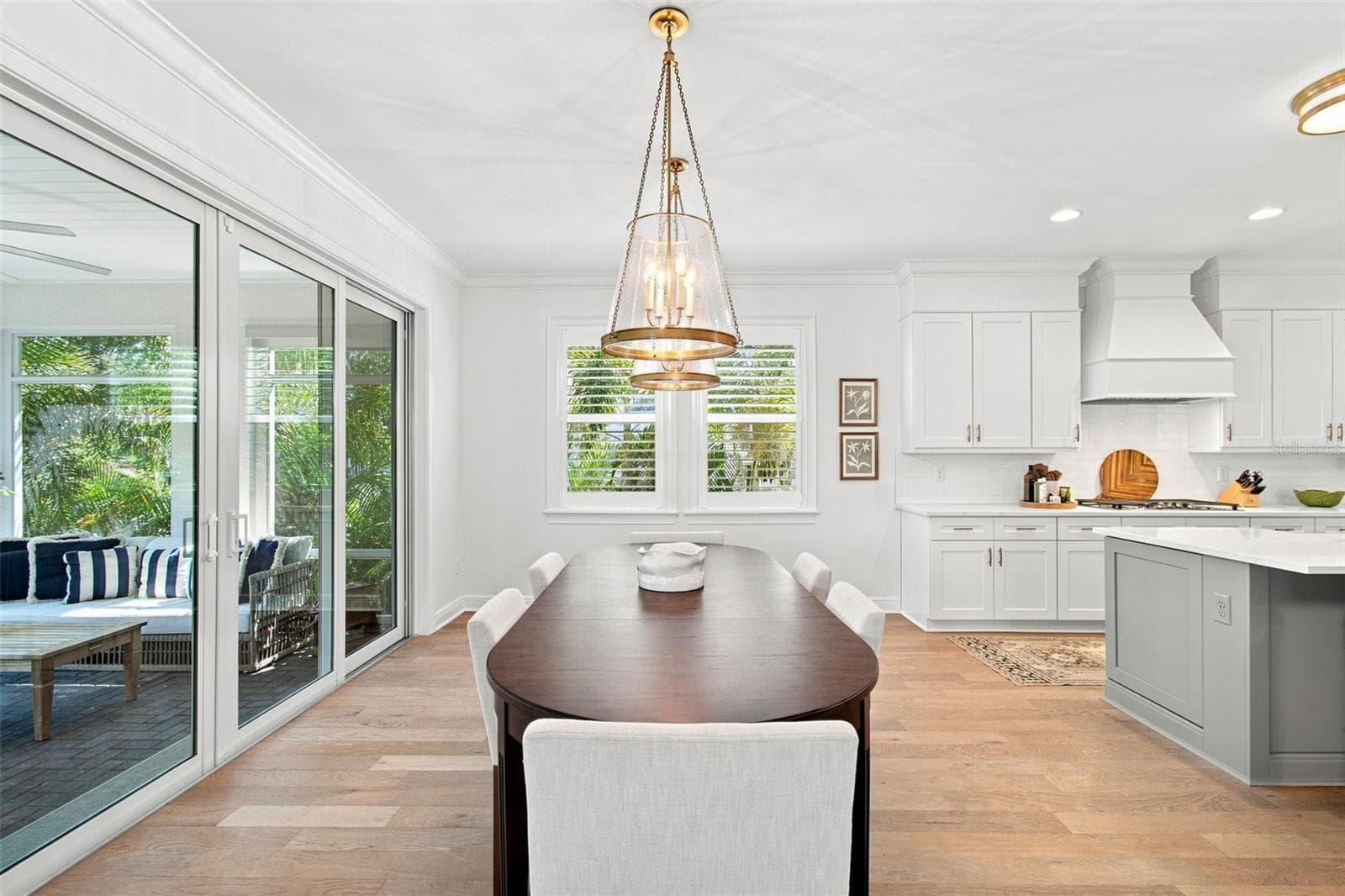 Dining area opens onto screen porch. - 2705 W TRILBY AVE, TAMPA