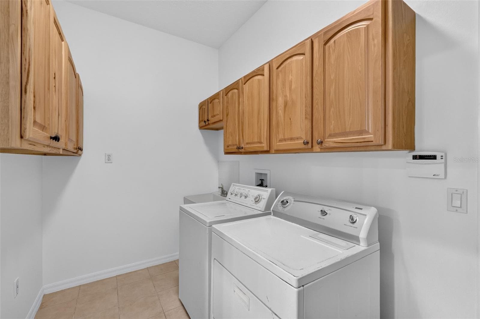 Laundry with cabinetry - 35015 RADIO RD, LEESBURG
