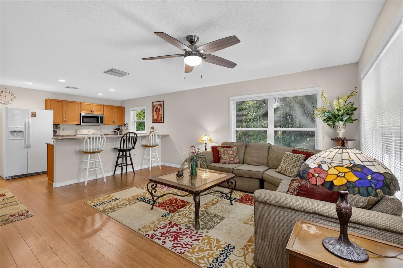 Living room into kitchen - 35015 RADIO RD, LEESBURG