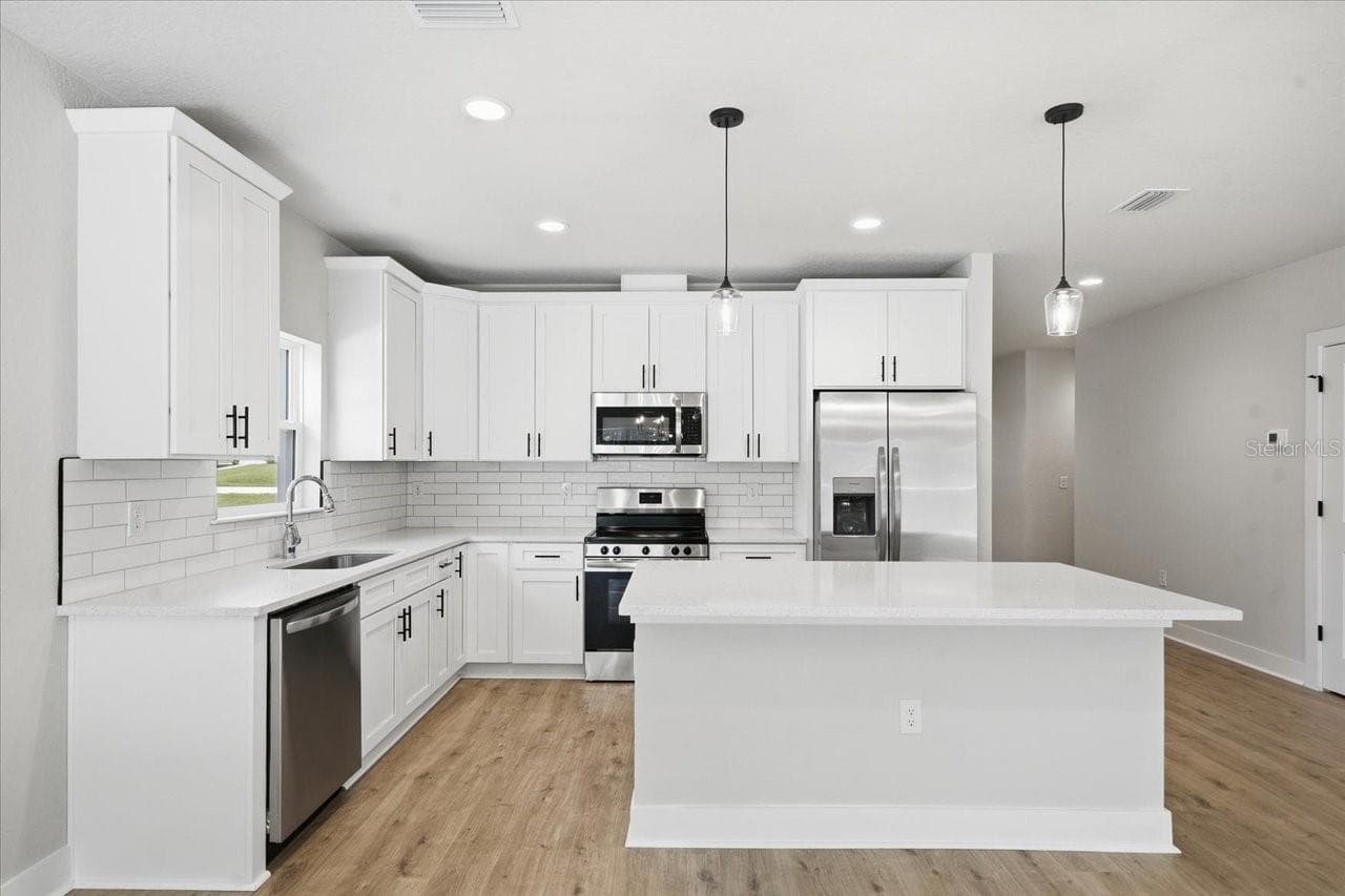 Single Family Residence at 13014 DOWNY WOODPECKER RD, WEEKI WACHEE, photo 4 of 27