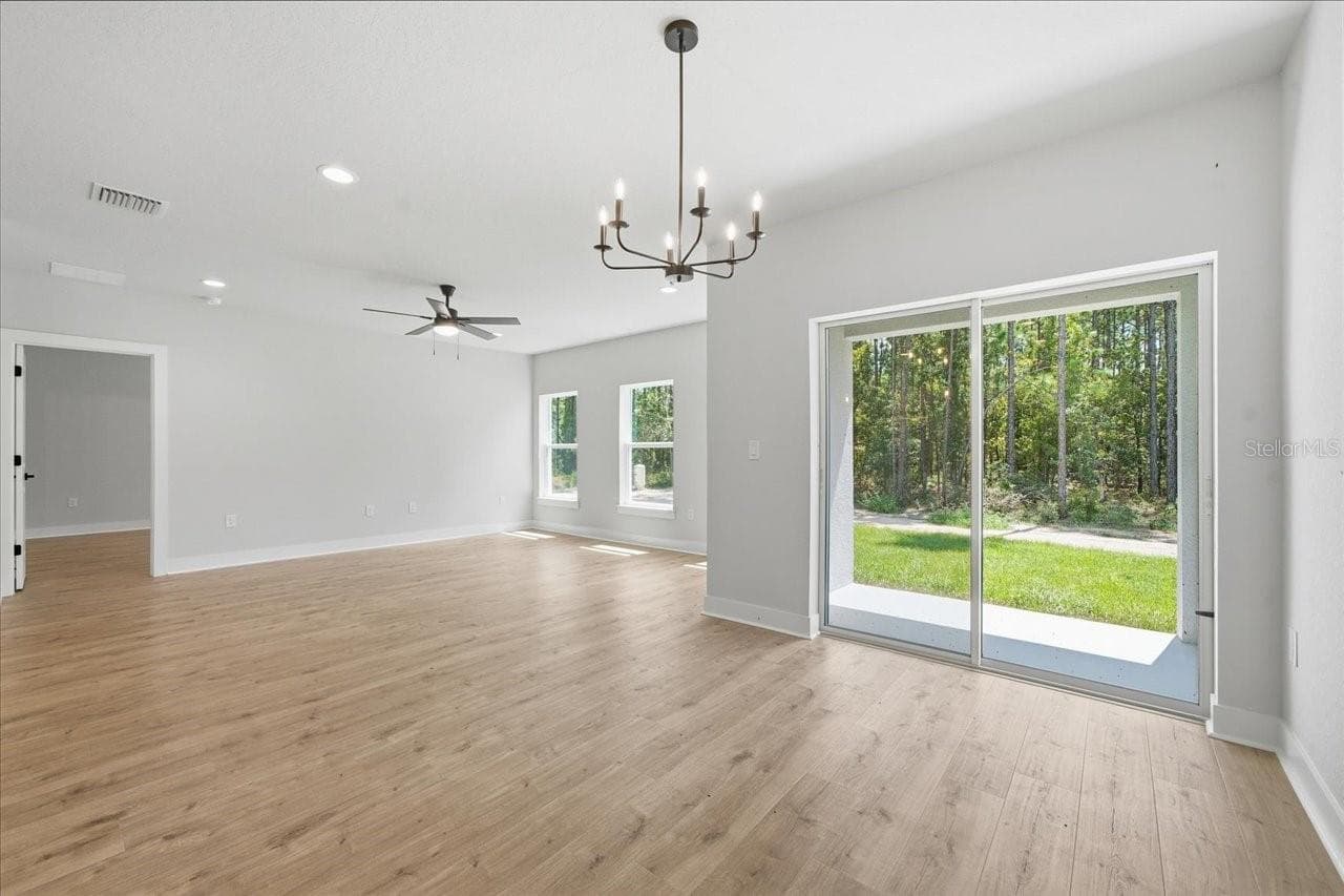 Single Family Residence at 13014 DOWNY WOODPECKER RD, WEEKI WACHEE, photo 10 of 27