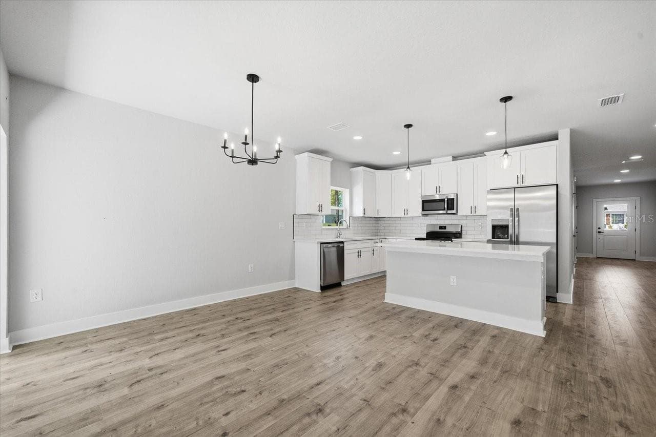 Single Family Residence at 13014 DOWNY WOODPECKER RD, WEEKI WACHEE, photo 12 of 27