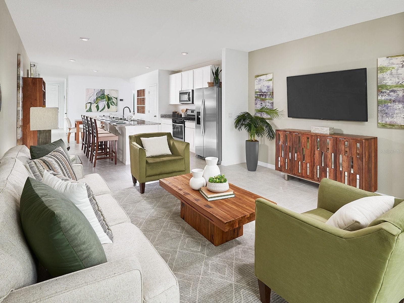 Photo is not of the actual home, but is an inspirational photo of builder’s model home and may depict options, furnishings, and/or decorator features that are not included. - 722 IMPALA RD, LAKE ALFRED