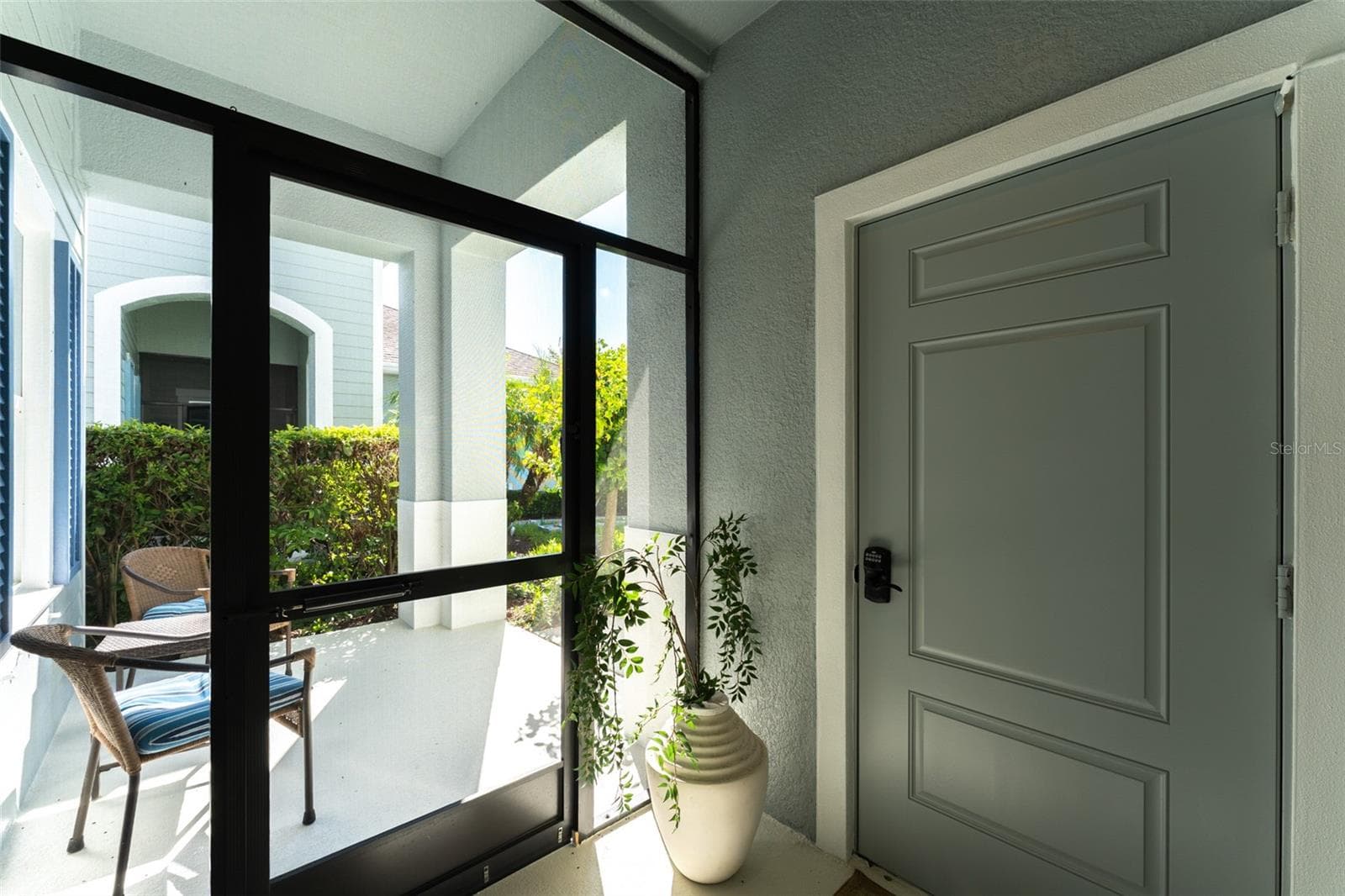 Covered & Screen Enclosed Entryway to Garage - 13533 CIRCA CROSSING DR, LITHIA