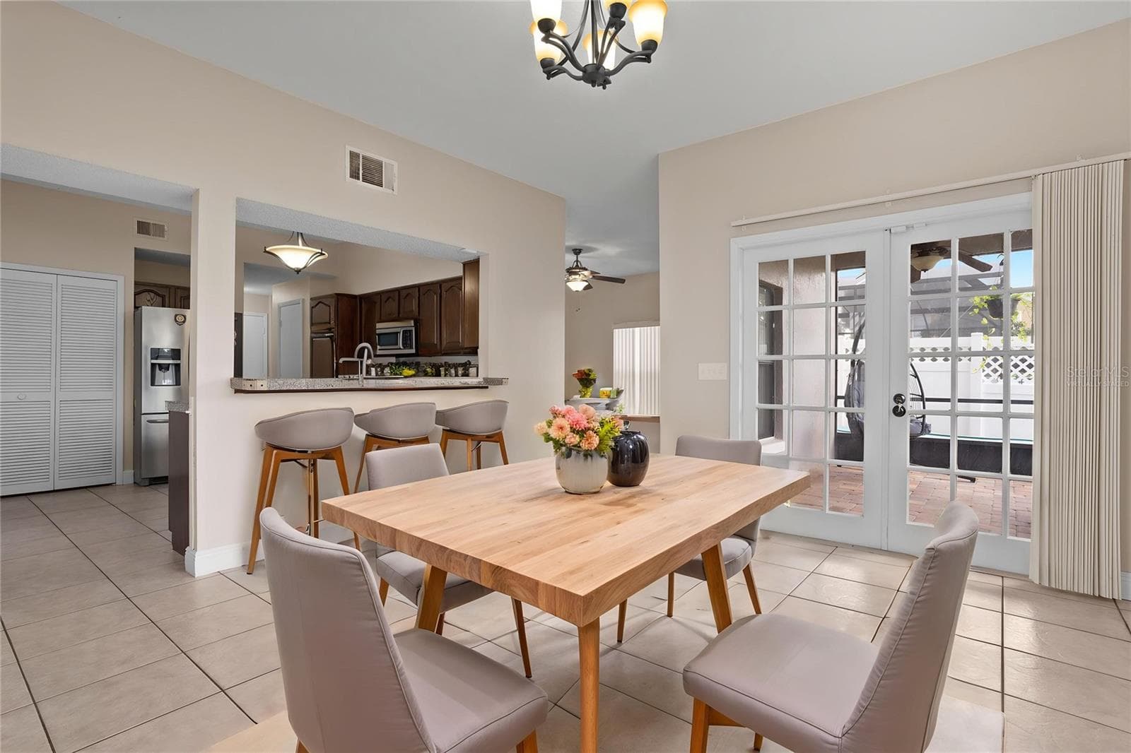 Virtually staged dining room - 518 HUXFORD CT, LAKE MARY