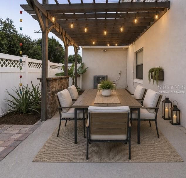 Virtually Staged outdoor dining area - 518 HUXFORD CT, LAKE MARY