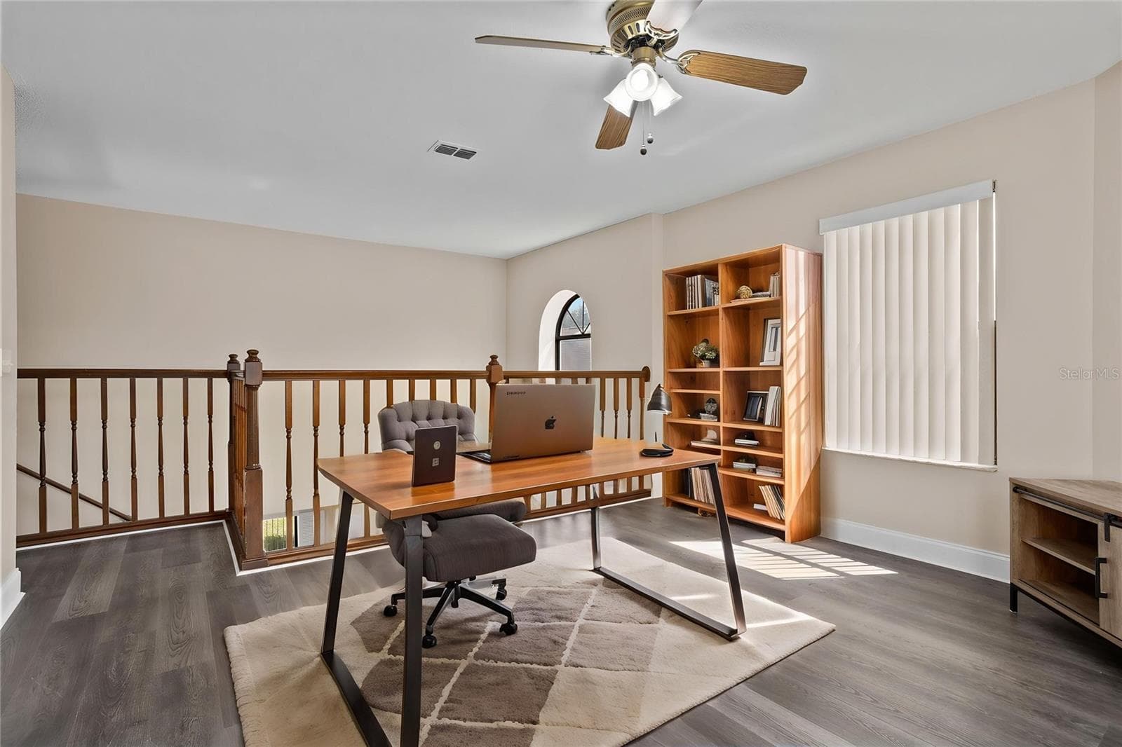 Look out over the lake as you work in the loft area. Or, you could enclose this as a 4th bedroom. - 518 HUXFORD CT, LAKE MARY