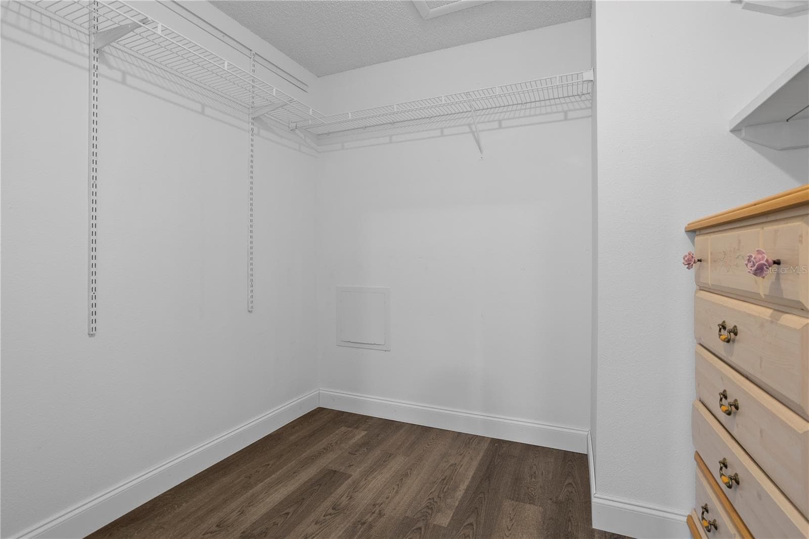 large walk in closet in primary bedroom - 518 HUXFORD CT, LAKE MARY