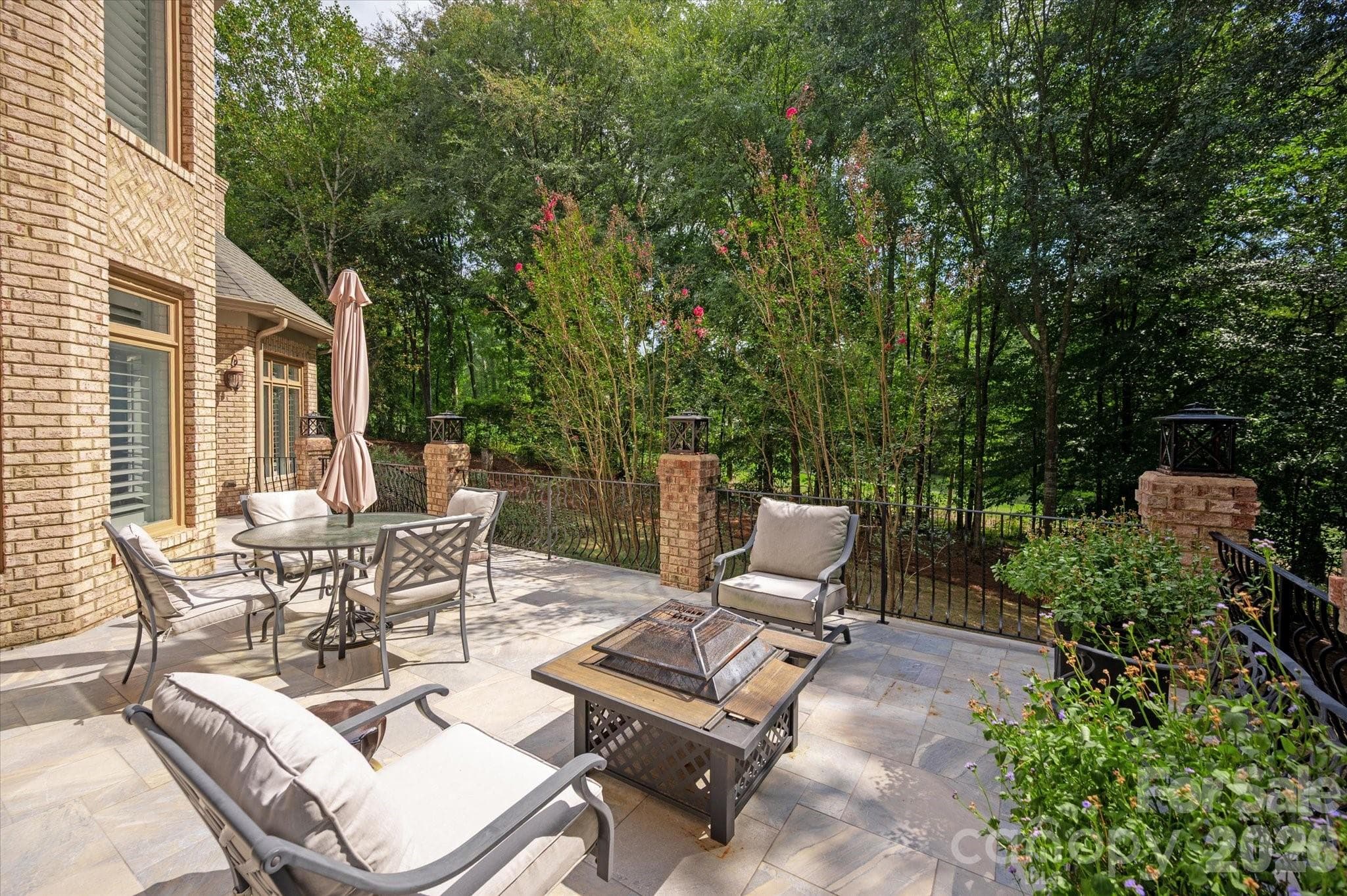 Backyard lower level terrace - 1005 Firethorne Club Drive, Marvin