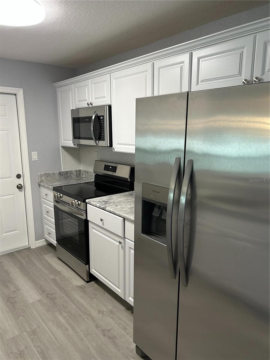 Single Family Residence at 1259 BEL AIRE DR, DAYTONA BEACH, photo 9 of 66