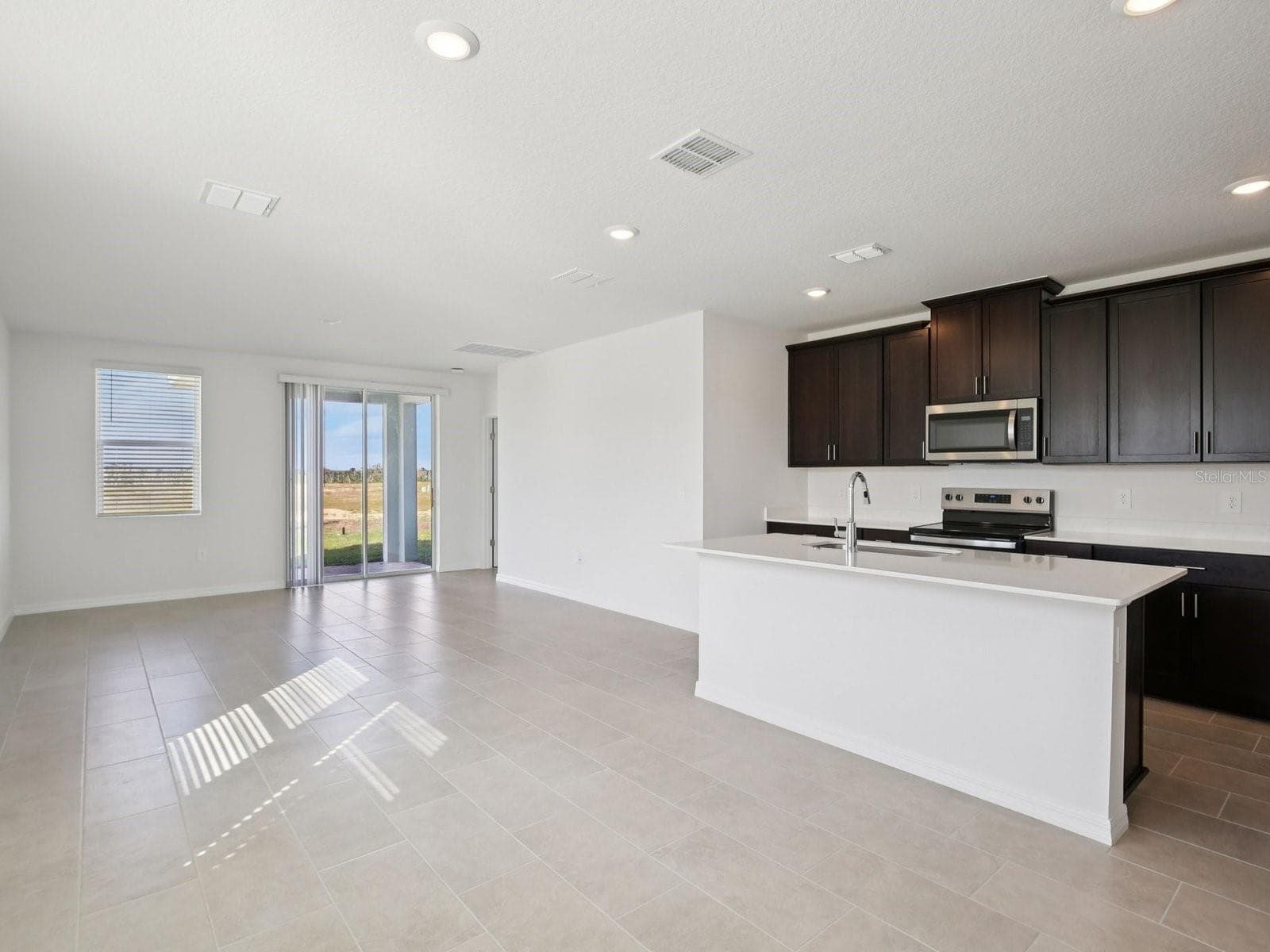Photo is not of the actual home, but is an inspirational photo of builder’s model home and may depict options, furnishings, and/or decorator features that are not included - 3920 TEAK LN, BARTOW