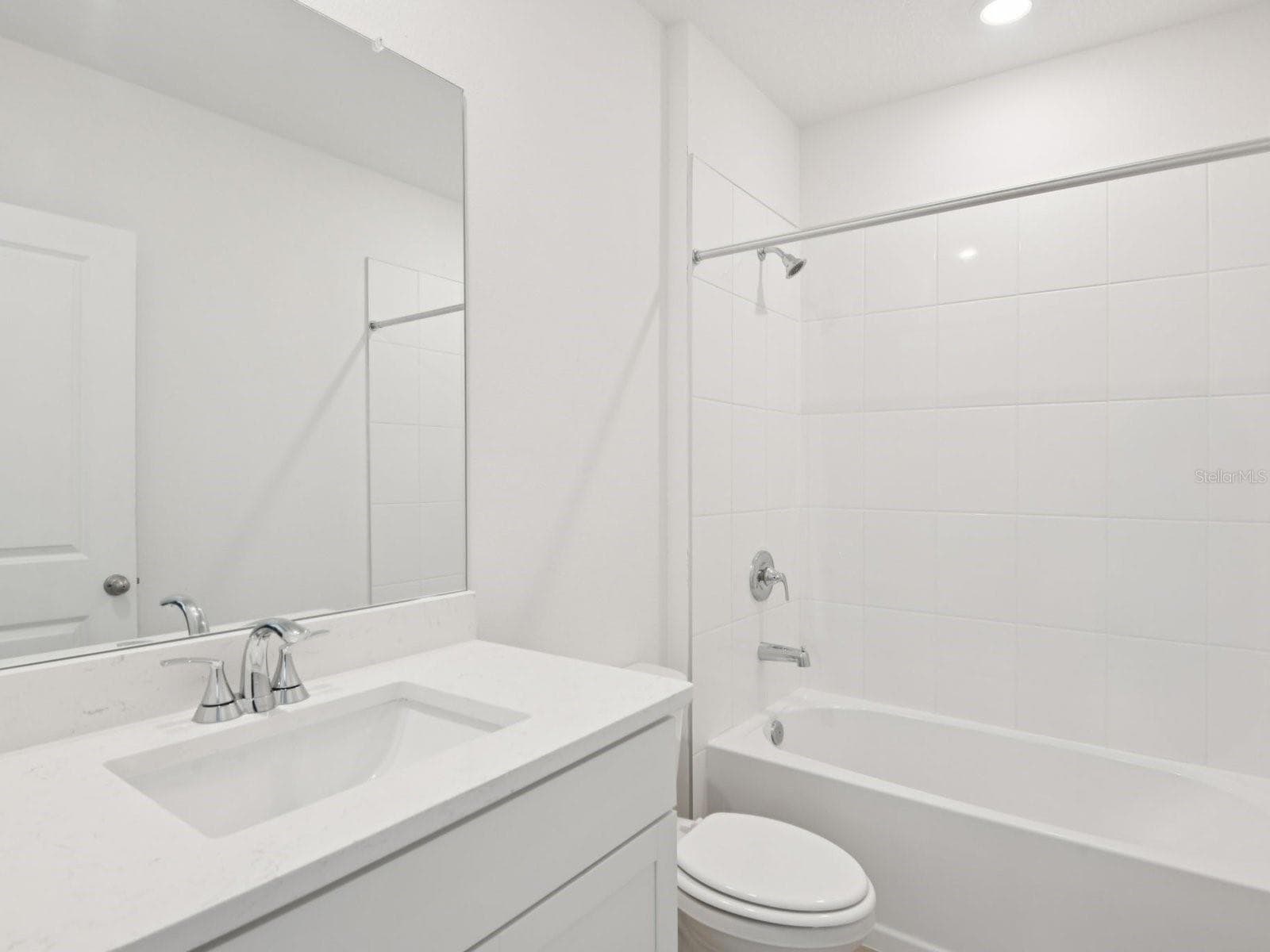 Photo is not of the actual home, but is an inspirational photo of builder’s model home and may depict options, furnishings, and/or decorator features that are not included - 2045 ROSEWOOD DR, BARTOW