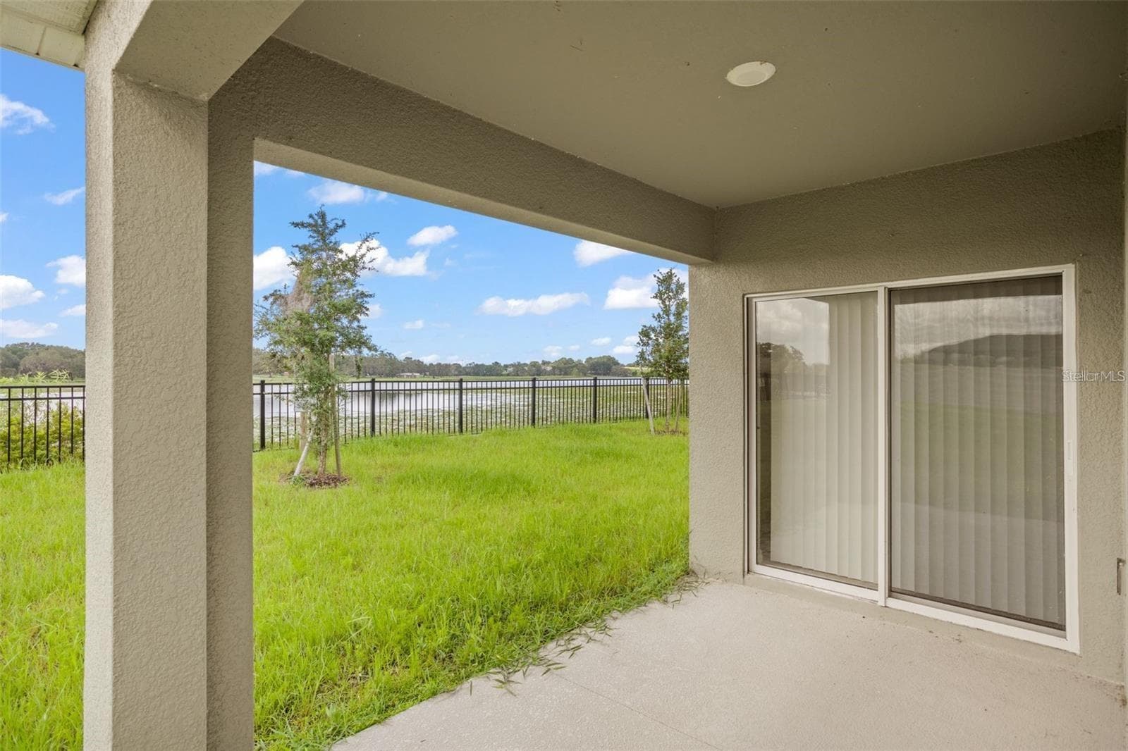 rear patio - 1112 FOX PATH, DAVENPORT