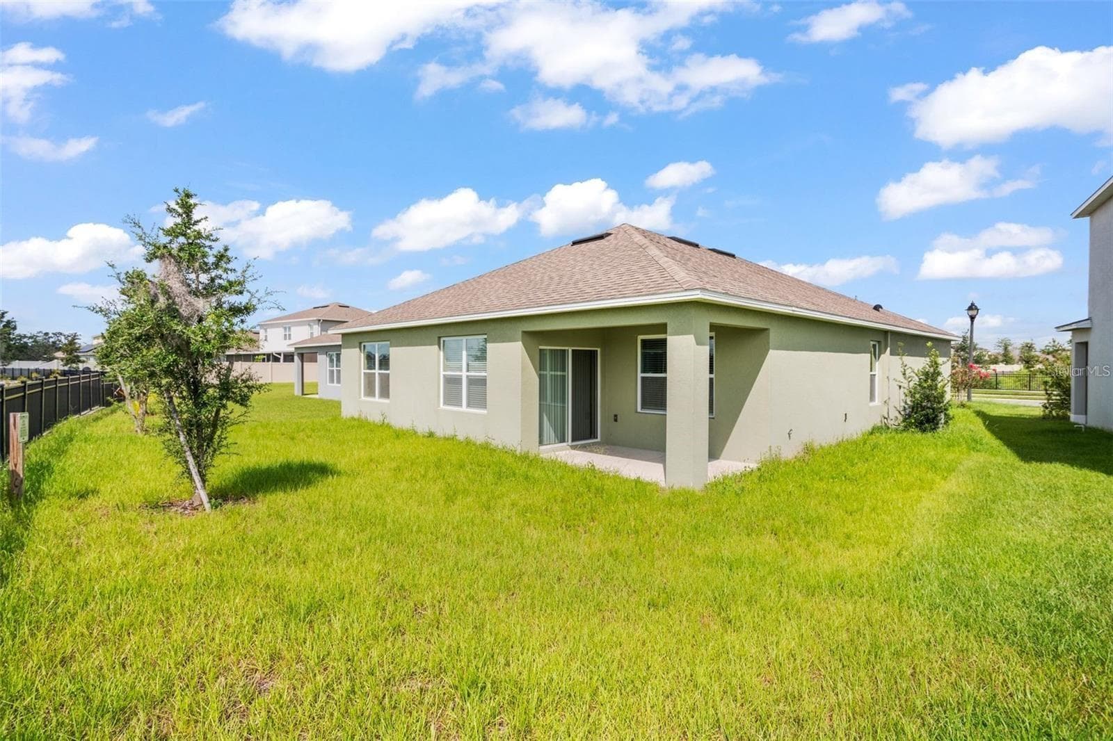 rear of home - 1112 FOX PATH, DAVENPORT