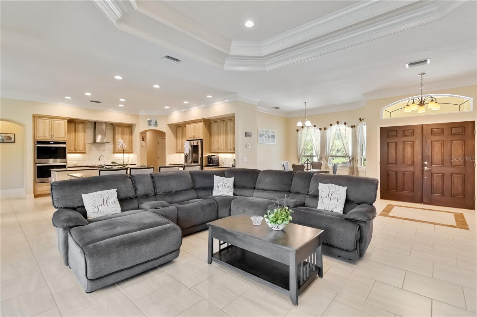 This home has an open floor plan. There are ten foot ceilings throughout the home and a tray ceiling in the great room (as shown above) and the primary bedroom. The attention to detail is impressive. - 1991 HEASLEY, ENGLEWOOD
