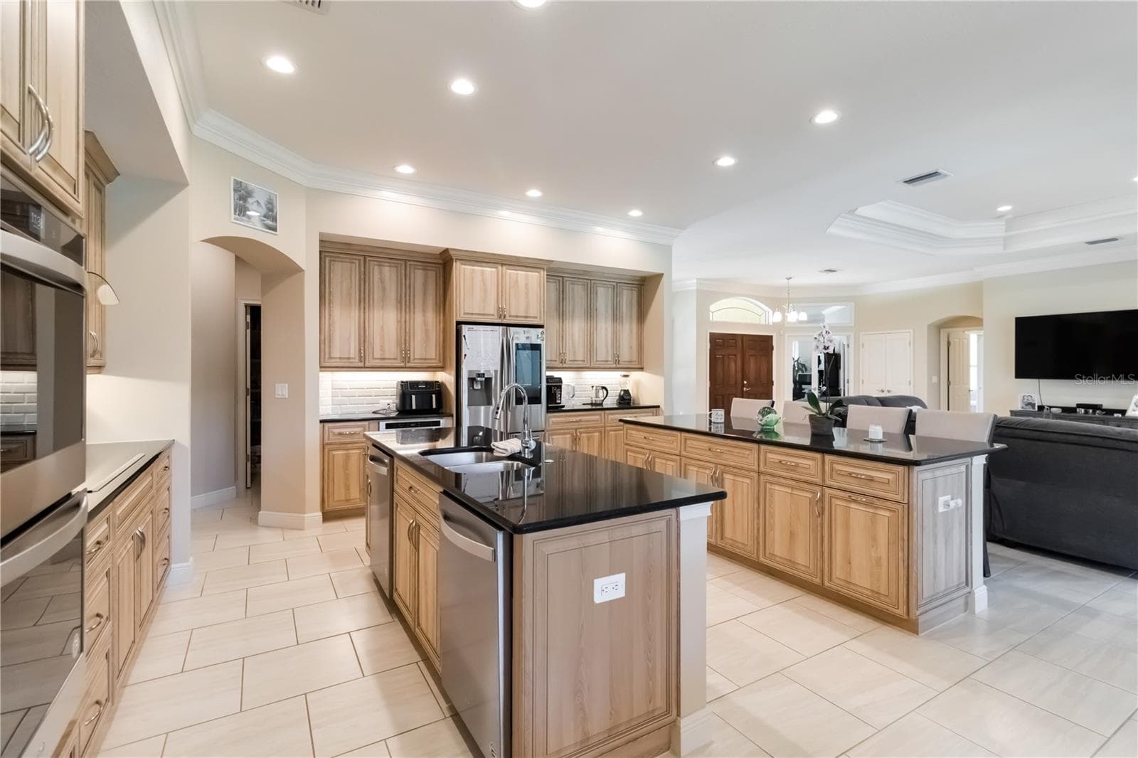 Another view of the open  floor plan. Notice the three arches in this picture. The attention to detail and craftsmanship are very well done here. - 1991 HEASLEY, ENGLEWOOD