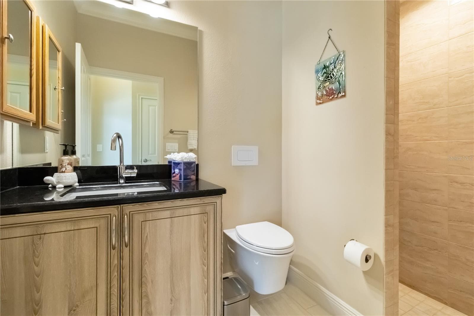 This is the second full bath with walk-in shower. This bathroom sits between bedrooms two and three in this split floor plan. - 1991 HEASLEY, ENGLEWOOD