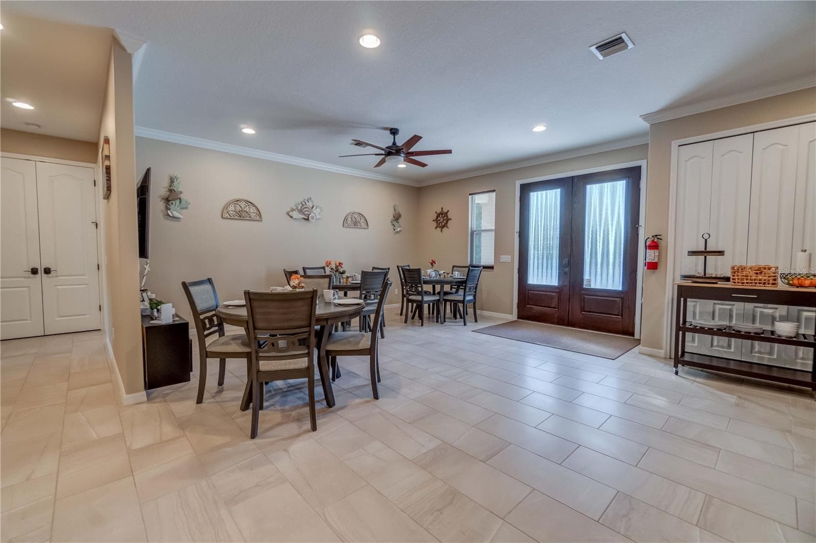 The double doors to the right is a pantry. The double doors to the left houses the water heater and storage. There are two water heater closets. One on each end of the hallway. - 1991 HEASLEY, ENGLEWOOD
