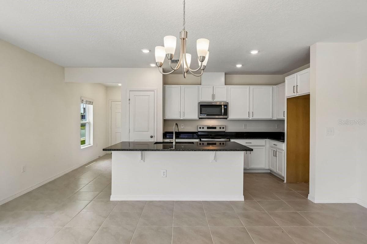 Townhouse at 627 MEADOWS EDGE PL, LAKE WALES, photo 2 of 17