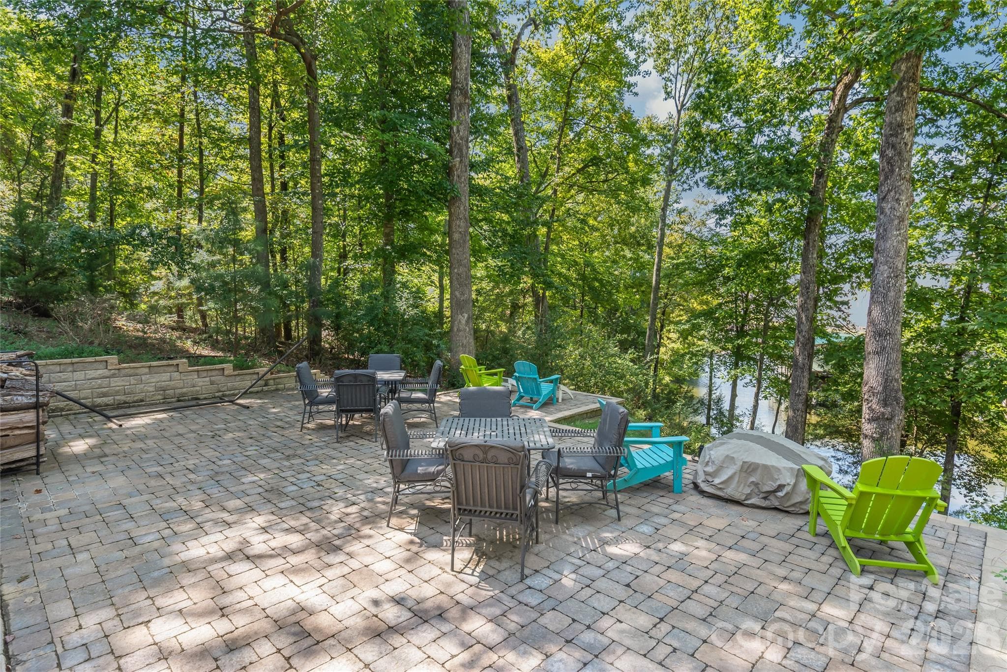 Additional patio on the lower tier is great for entertaining - 13934 Kings Carriage Lane, Charlotte