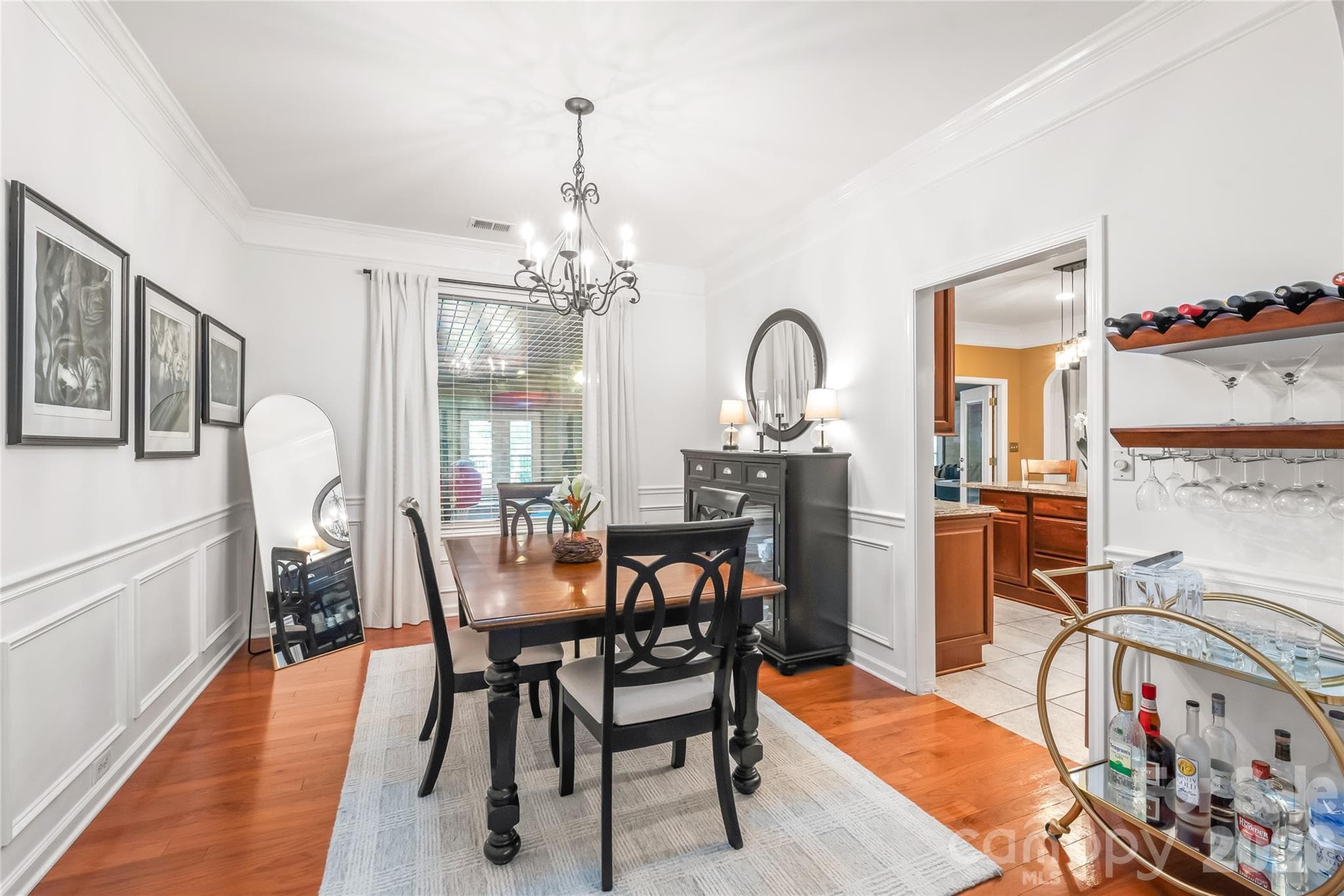 A dining area that is made for a gathering of friends or holiday meals - 13934 Kings Carriage Lane, Charlotte
