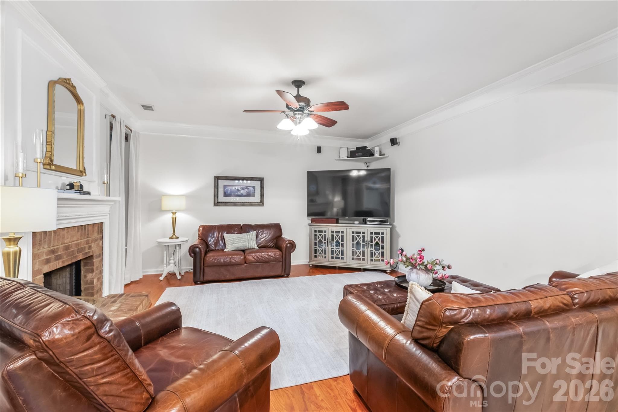 The living area is comfy and open to the kitchen - 13934 Kings Carriage Lane, Charlotte