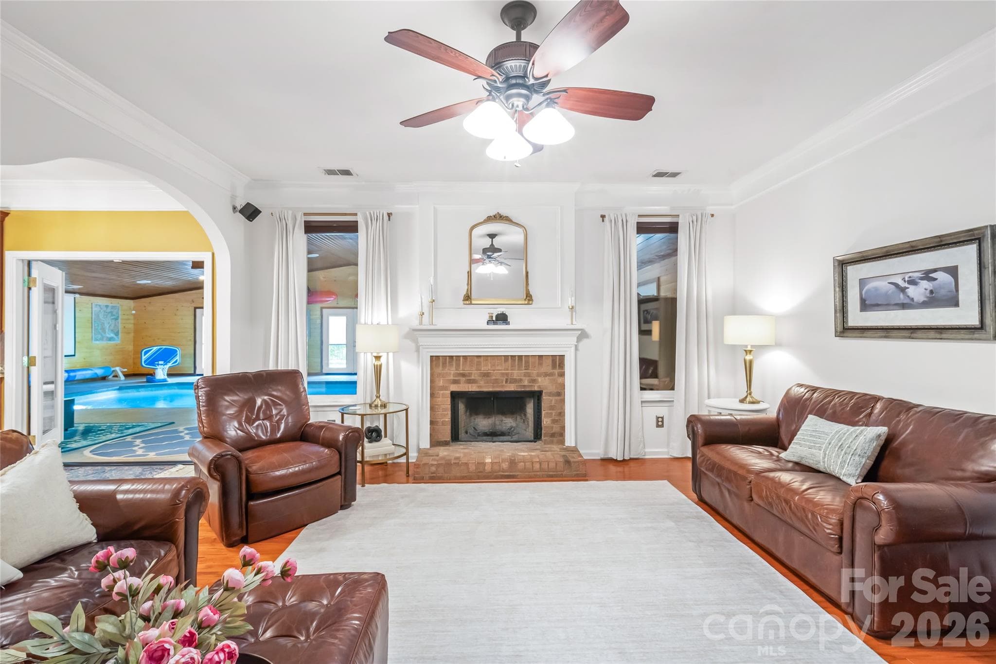 A wood-burning fireplace is adds a nice focal point to this relaxed heart of the home - 13934 Kings Carriage Lane, Charlotte
