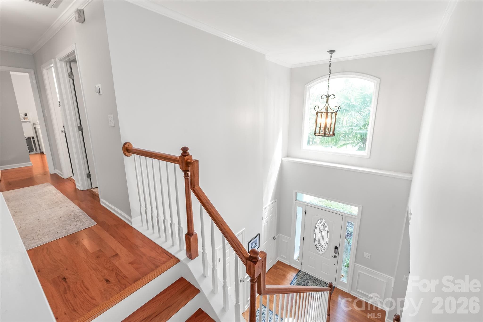 Notice the wood flooring continues on the second story - 13934 Kings Carriage Lane, Charlotte