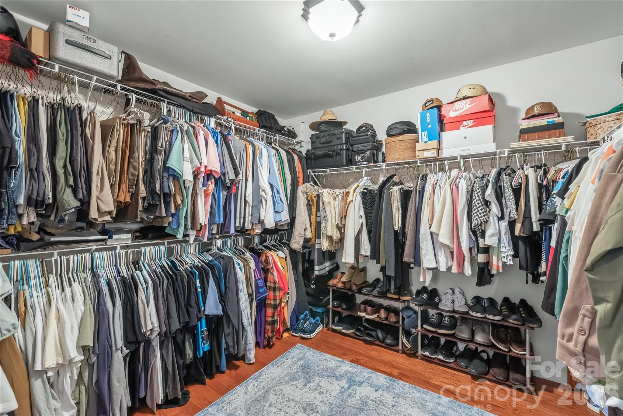 Large primary closet has room for everything - 13934 Kings Carriage Lane, Charlotte