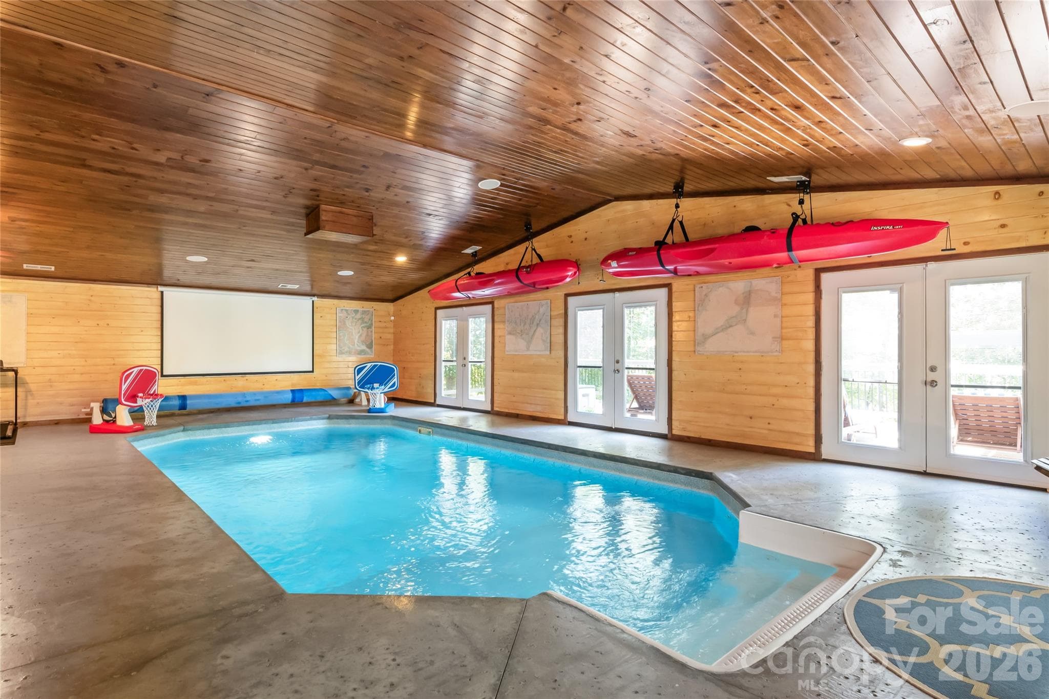 Double doors open up to the lovely outdoor surroundings - 13934 Kings Carriage Lane, Charlotte