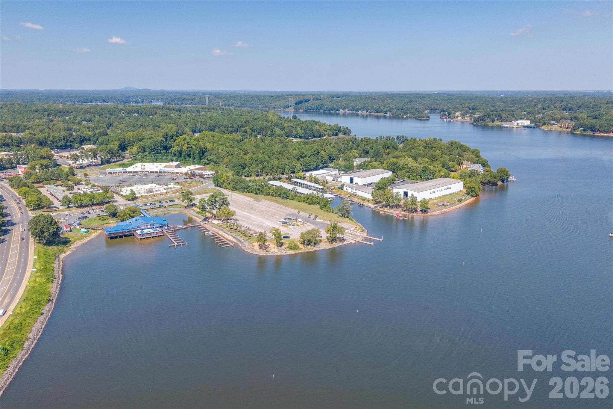 The view of Papa Doc's looking back toward the home. Take the boat to dinner! - 13934 Kings Carriage Lane, Charlotte