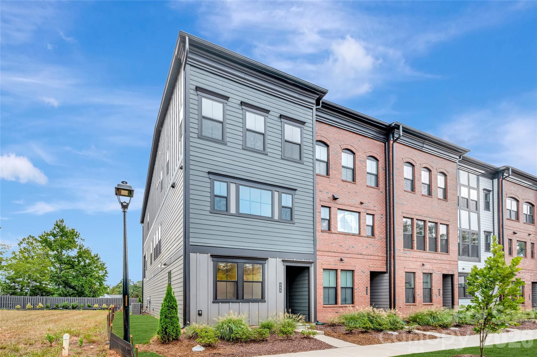 End unit townhome with added windows - 444 Old Town Village Road, Waxhaw