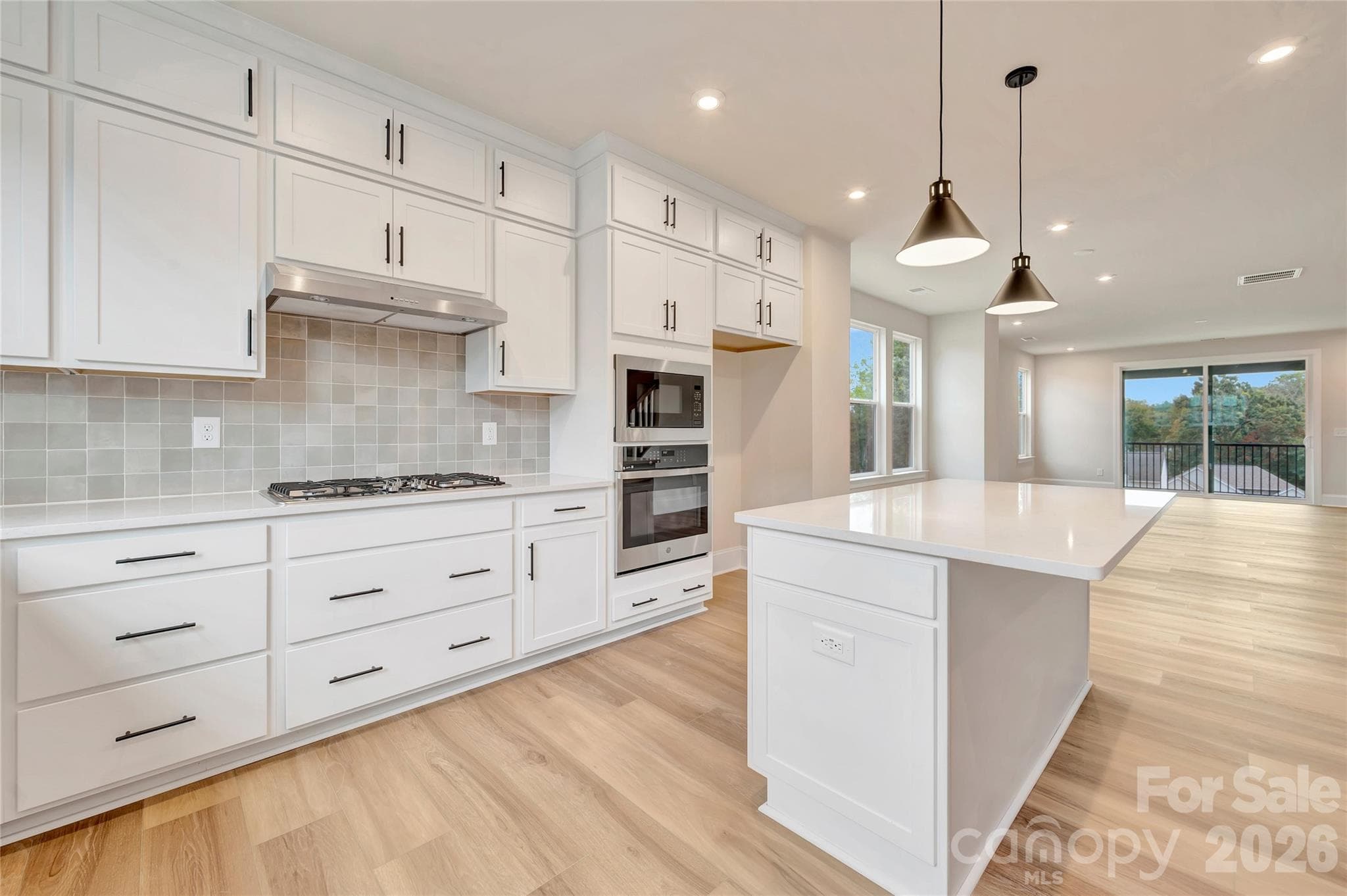Light filled gourmet kitchen - 444 Old Town Village Road, Waxhaw