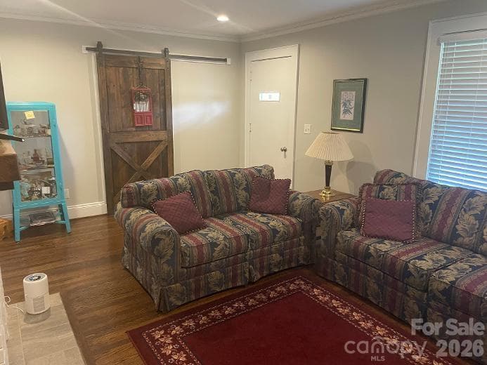 Living Room with barn door to separate the hair salon/barber shop - 1670 Dale Earnhardt Boulevard, Kannapolis