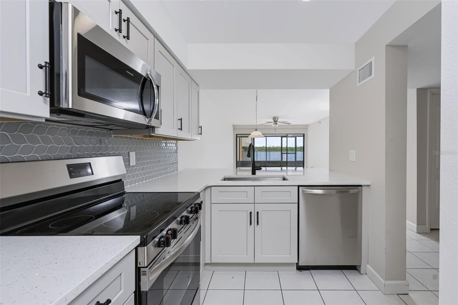 Kitchen with waterview! - 1751 BEACH RD #202, ENGLEWOOD