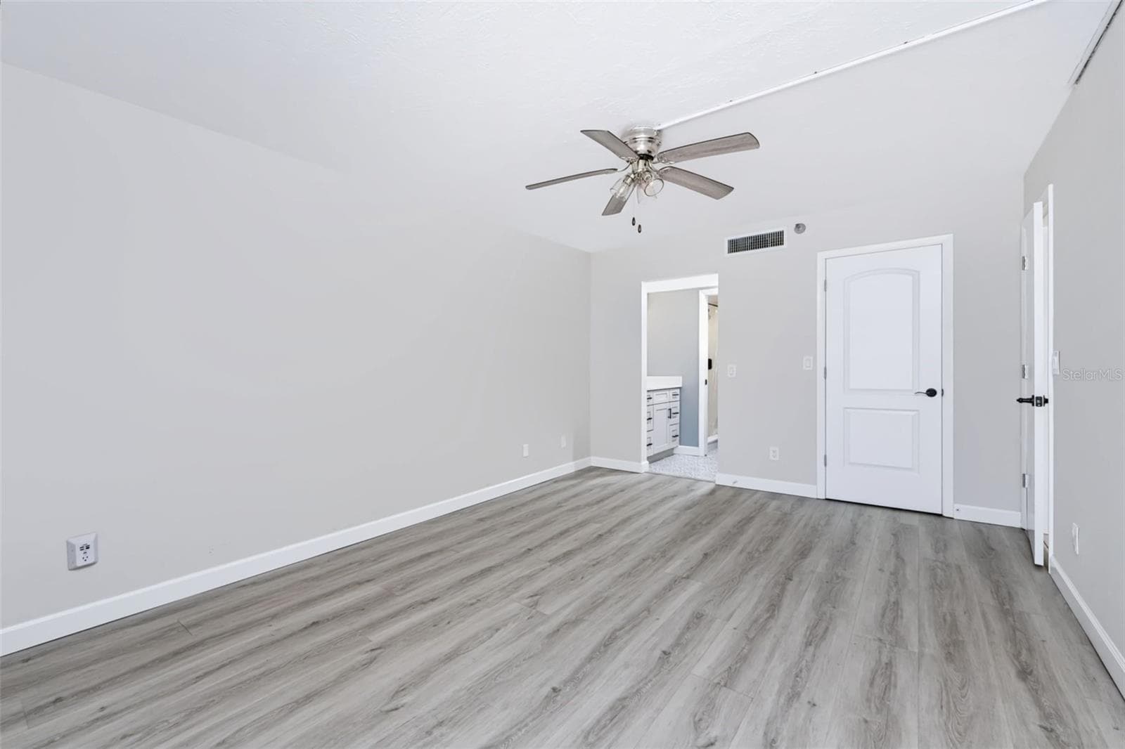Primary Bath & Laundry Closet Door Shown - 1751 BEACH RD #202, ENGLEWOOD