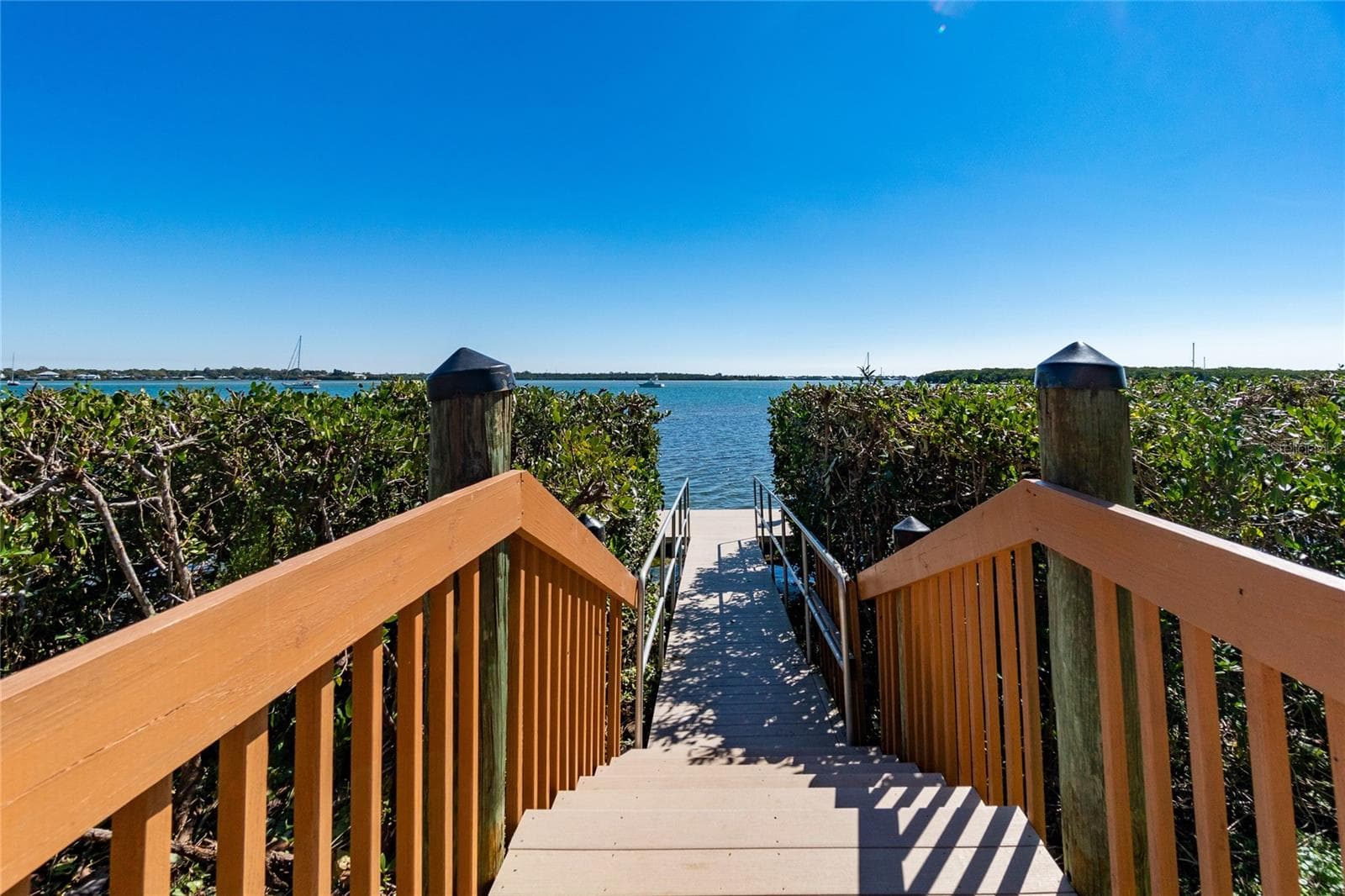 With walkway to dock. - 1751 BEACH RD #202, ENGLEWOOD