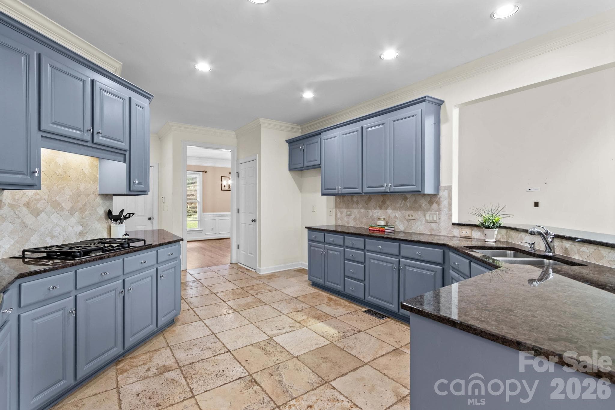 Tons of cabinet space plus a pantry and laundry room adjacent provides an abundance of storage. - 12822 Cadgwith Cove Drive, Huntersville