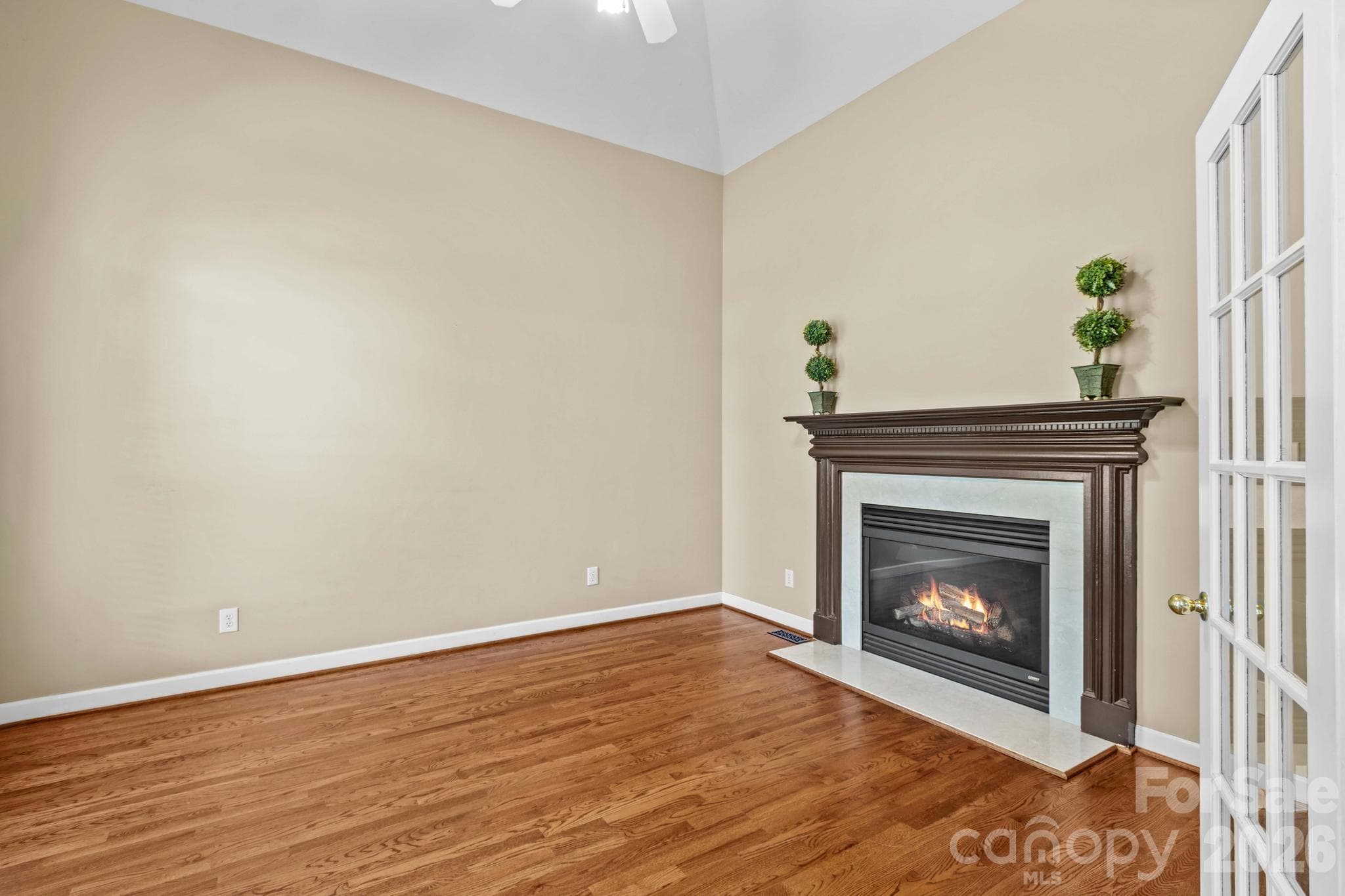Office with French doors and gas fireplace is the perfect place to work from home. - 12822 Cadgwith Cove Drive, Huntersville